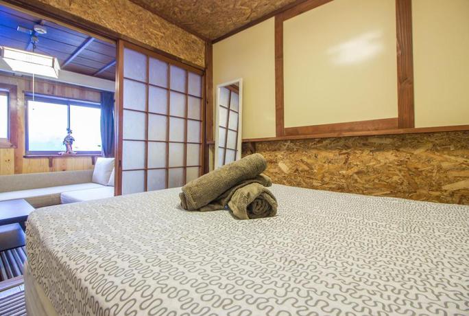Imagen de la habitación del Hotel Gojo Paradiso Homes. Foto 15