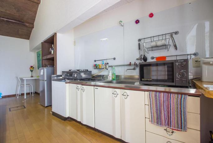 Imagen de la habitación del Hotel Gojo Paradiso Homes. Foto 19