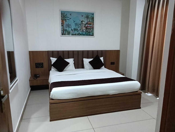 Imagen de la habitación del Hotel Gokul Dham Haridwar. Foto 2