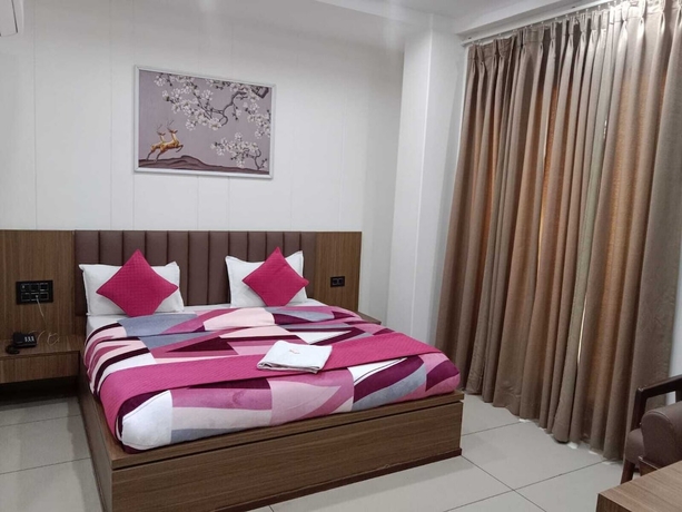 Imagen de la habitación del Hotel Gokul Dham Haridwar. Foto 3