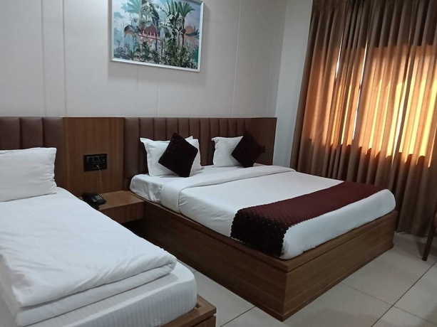 Imagen de la habitación del Hotel Gokul Dham Haridwar. Foto 4