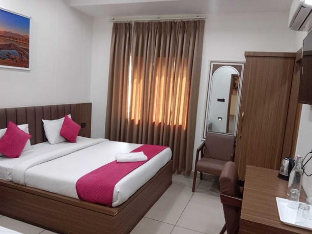 Imagen de la habitación del Hotel Gokul Dham Haridwar. Foto 5