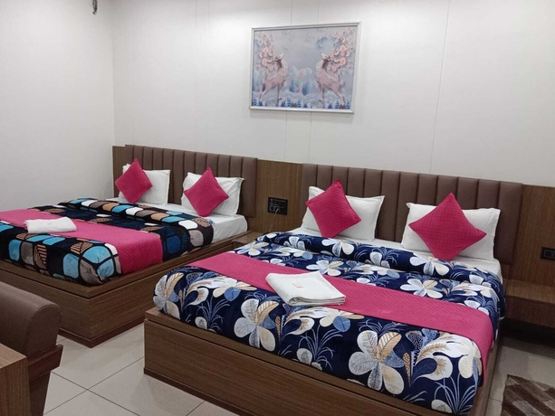 Imagen de la habitación del Hotel Gokul Dham Haridwar. Foto 6