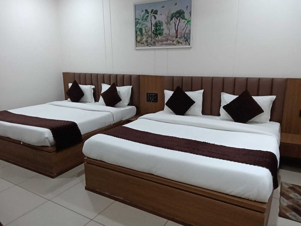 Imagen de la habitación del Hotel Gokul Dham Haridwar. Foto 7