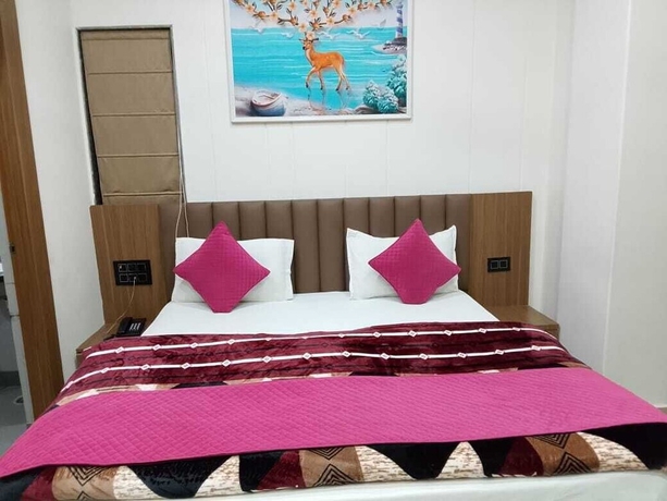 Imagen de la habitación del Hotel Gokul Dham Haridwar. Foto 8