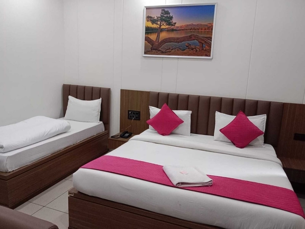 Imagen de la habitación del Hotel Gokul Dham Haridwar. Foto 9