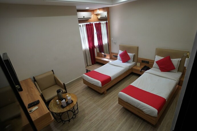 Imagen de la habitación del Hotel Gokul, Gandhidham. Foto 18