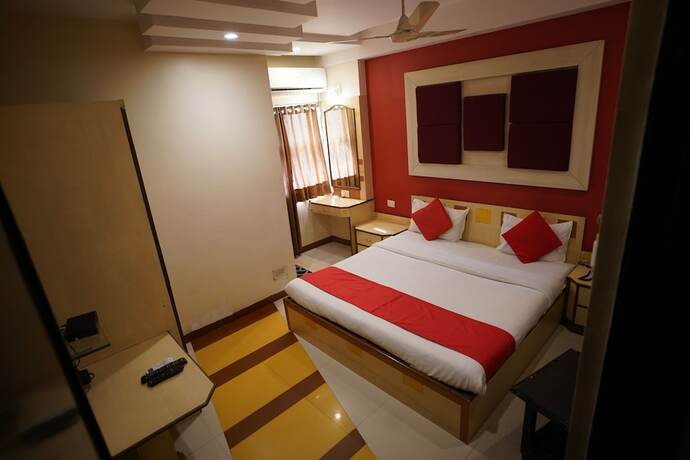 Imagen de la habitación del Hotel Gokul, Gandhidham. Foto 19