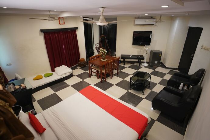 Imagen de la habitación del Hotel Gokul, Gandhidham. Foto 23