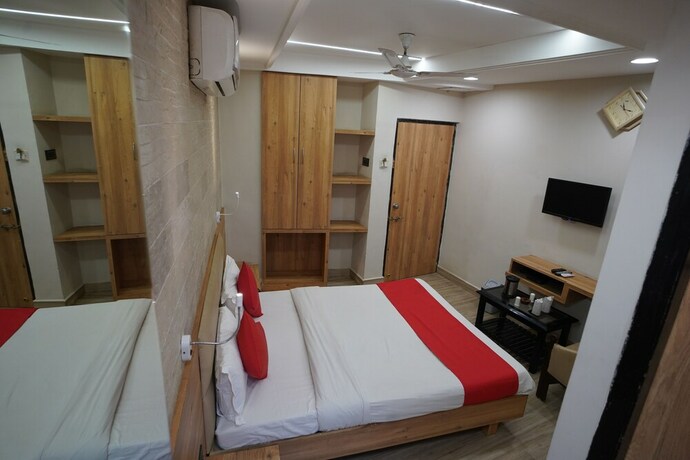 Imagen de la habitación del Hotel Gokul, Gandhidham. Foto 30