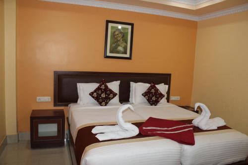 Imagen de la habitación del Hotel Gokul Plaza. Foto 18