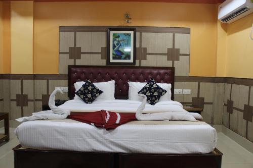 Imagen de la habitación del Hotel Gokul Plaza. Foto 19