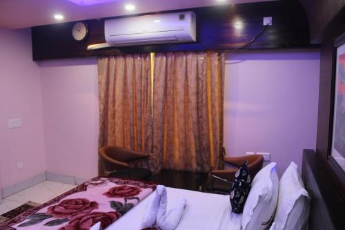 Imagen de la habitación del Hotel Gokul Plaza. Foto 20