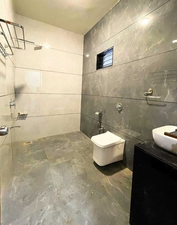 Imagen de la habitación del Hotel Gokul Resort. Foto 11