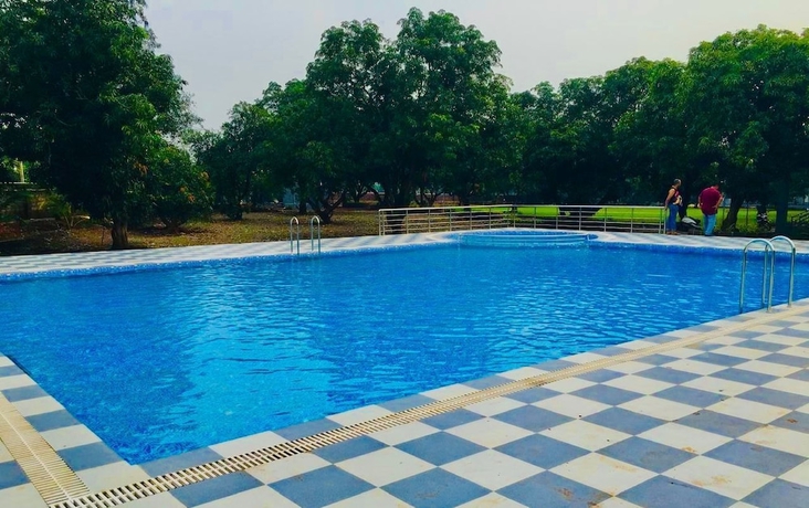 Imagen de la piscina del Hotel Gokul Resort. Foto 14
