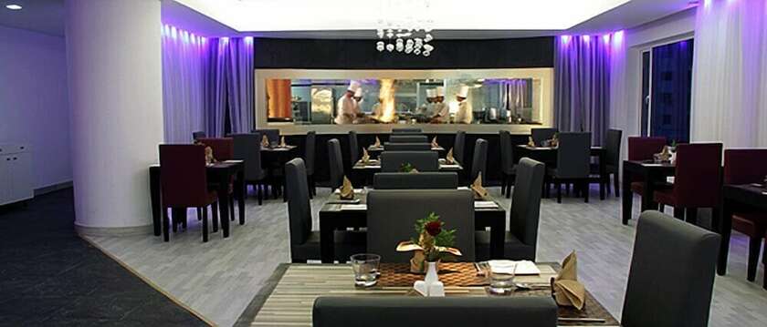 Imagen del bar/restaurante del Hotel Gokulam Park and Convention Centre. Foto 15