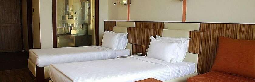 Imagen de la habitación del Hotel Gokulam Park and Convention Centre. Foto 17