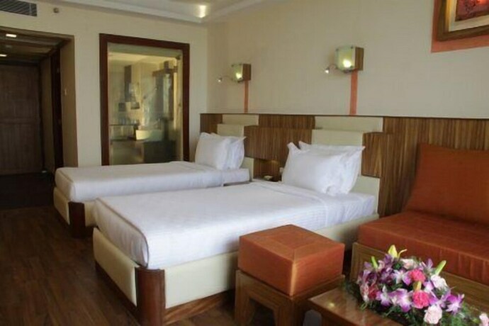 Imagen de la habitación del Hotel Gokulam Park and Convention Centre. Foto 18