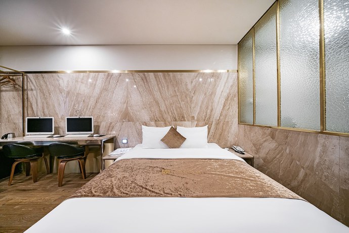 Imagen de la habitación del Hotel Gold Hotel. Foto 8