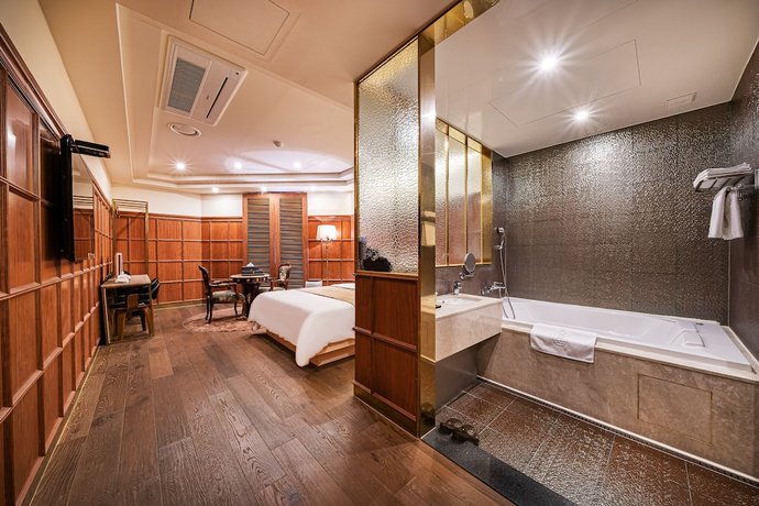 Imagen de la habitación del Hotel Gold Hotel. Foto 13