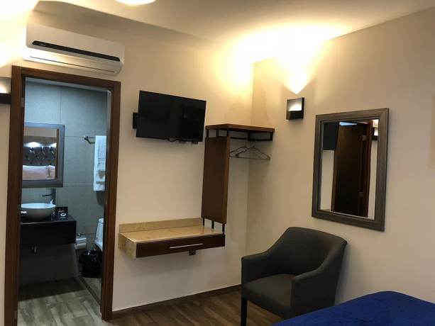 Imagen de la habitación del Hotel Gold Palace. Foto 8