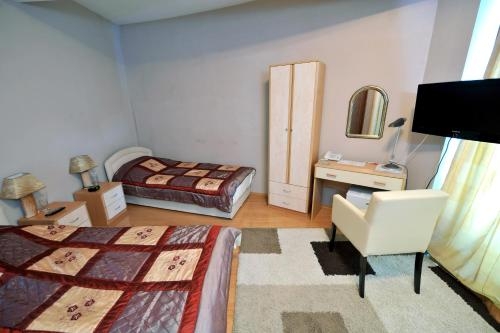 Imagen de la habitación del Hotel Gold, Pljevlja. Foto 7