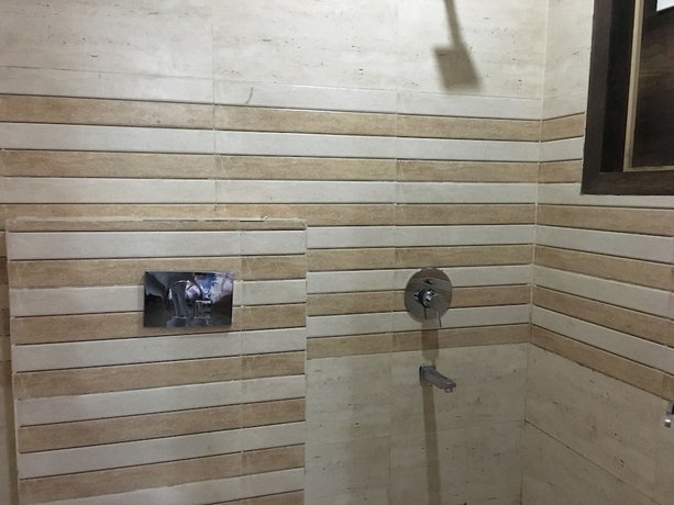 Imagen de la habitación del Hotel Gold Residency Kurukshetra. Foto 11