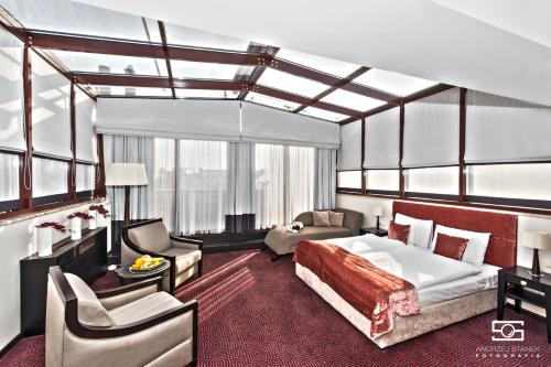 Imagen de la habitación del Hotel Gold Silvia. Foto 7