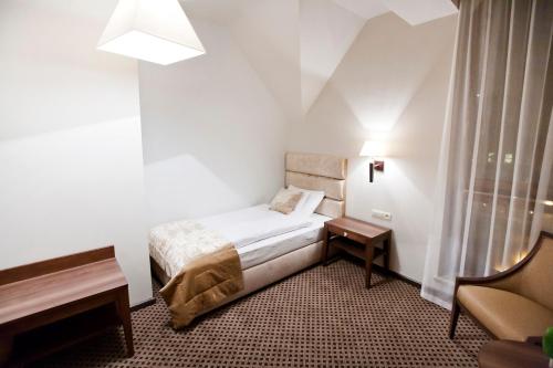 Imagen de la habitación del Hotel Gold Silvia. Foto 10