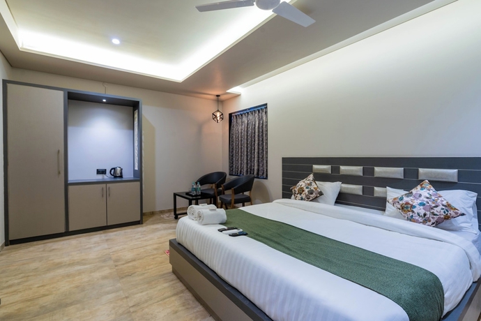 Imagen de la habitación del Hotel Gold Star, Rajkot. Foto 6