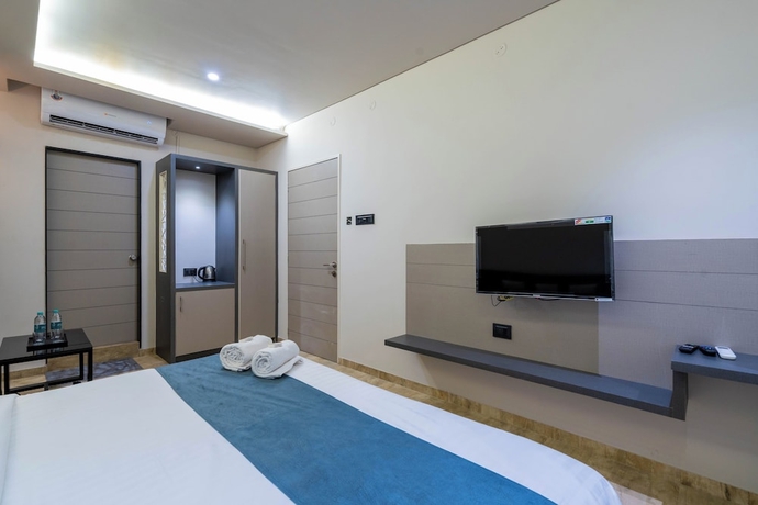 Imagen de la habitación del Hotel Gold Star, Rajkot. Foto 8