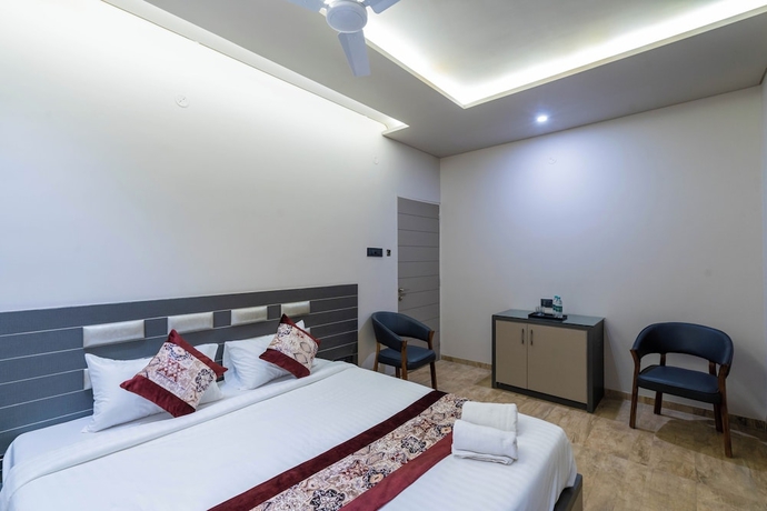 Imagen de la habitación del Hotel Gold Star, Rajkot. Foto 11