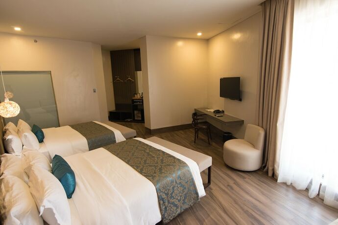 Imagen de la habitación del Hotel Goldberry Lite Iloilo. Foto 11