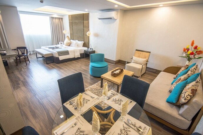 Imagen de la habitación del Hotel Goldberry Lite Iloilo. Foto 12