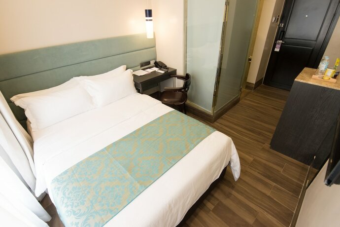 Imagen de la habitación del Hotel Goldberry Lite Iloilo. Foto 15