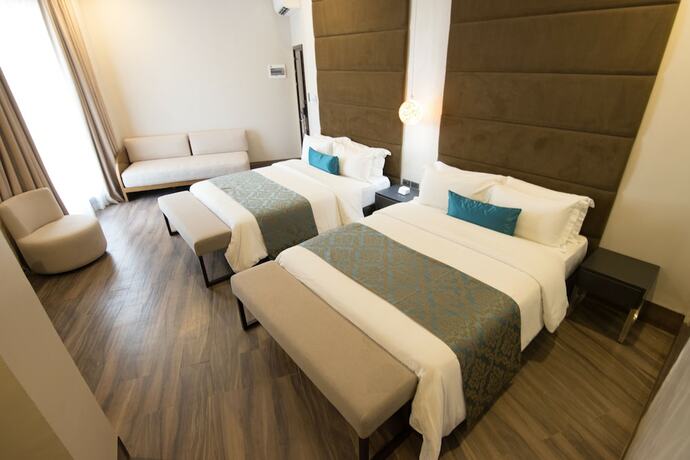 Imagen de la habitación del Hotel Goldberry Lite Iloilo. Foto 16