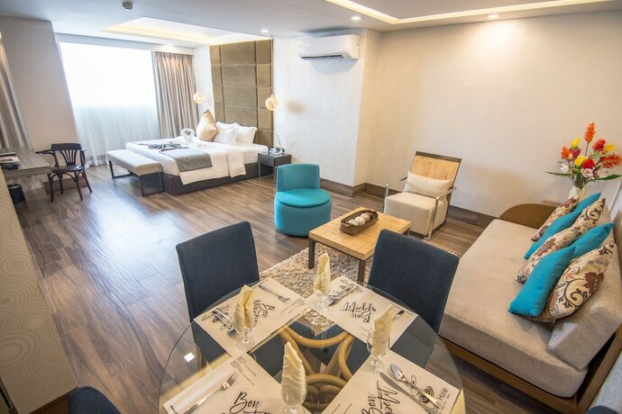 Imagen de la habitación del Hotel Goldberry Lite Iloilo. Foto 17