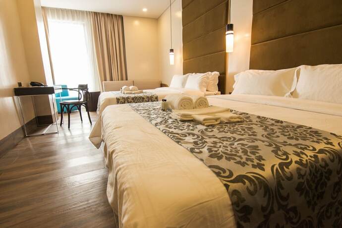 Imagen de la habitación del Hotel Goldberry Lite Iloilo. Foto 19