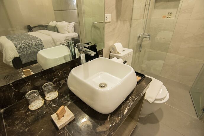 Imagen de la habitación del Hotel Goldberry Lite Iloilo. Foto 22