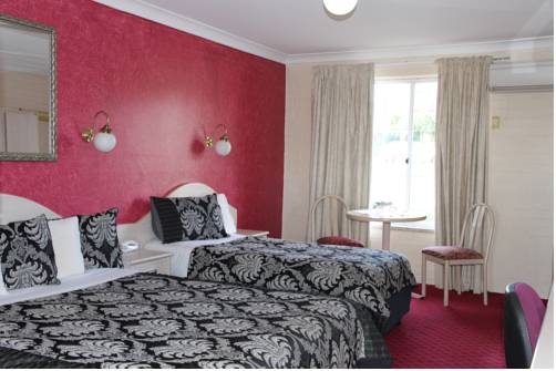 Imagen de la habitación del Hotel Golden Age Motor Inn. Foto 3