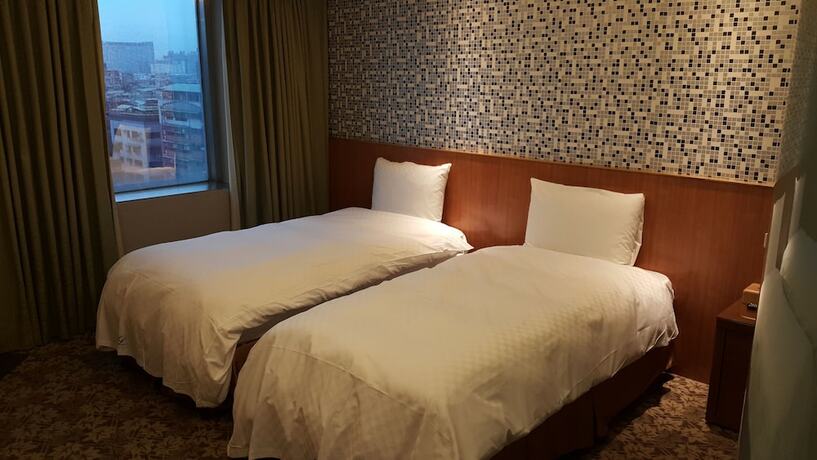 Imagen de la habitación del Hotel Golden Age, Taipei. Foto 12