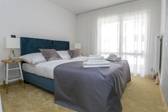 Imagen de la habitación del Hotel Golden Apartments. Foto 8