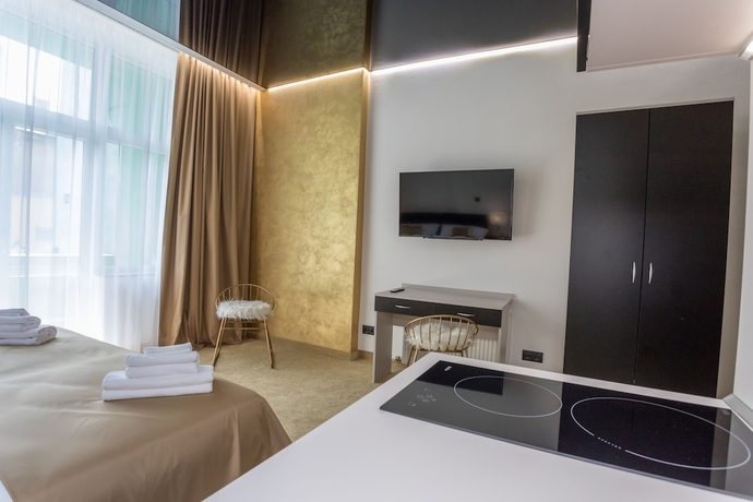 Imagen de la habitación del Hotel Golden Apartments. Foto 9