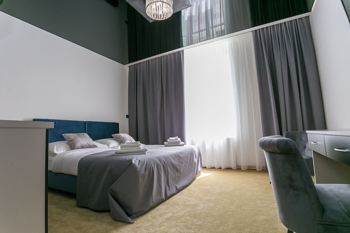 Imagen de la habitación del Hotel Golden Apartments. Foto 11