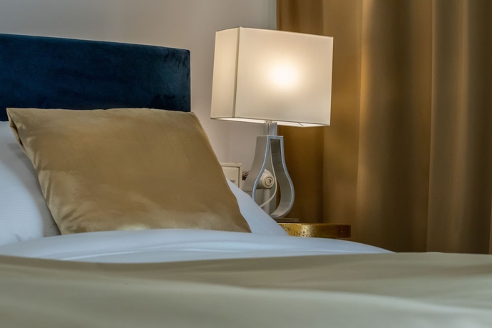 Imagen de la habitación del Hotel Golden Apartments. Foto 12