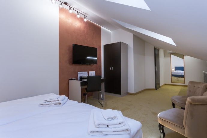 Imagen de la habitación del Hotel Golden Apartments. Foto 14