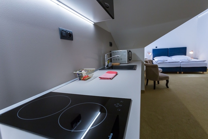 Imagen de la habitación del Hotel Golden Apartments. Foto 15