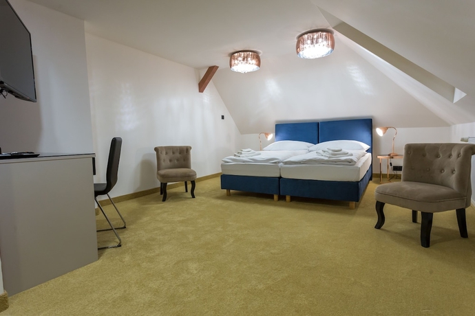 Imagen de la habitación del Hotel Golden Apartments. Foto 16