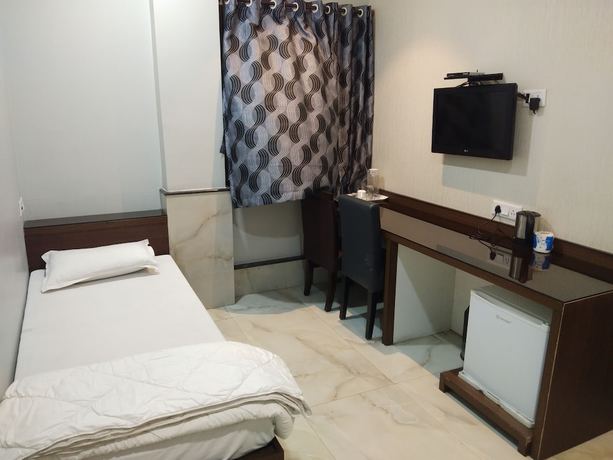 Imagen de la habitación del Hotel Golden Apple Boutique. Foto 15