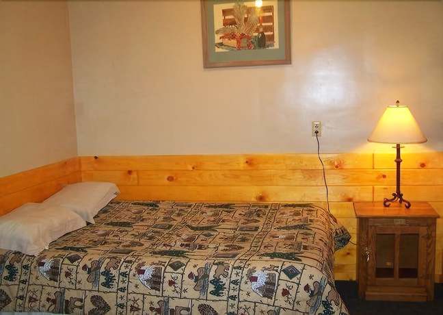 Imagen de la habitación del Hotel Golden Bear Cottages. Foto 7